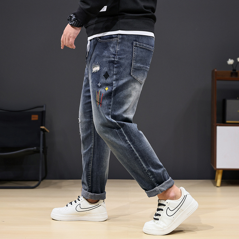 加肥加大码男秋季弹力小脚牛仔裤胖子宽松百搭长裤裤松紧腰潮流