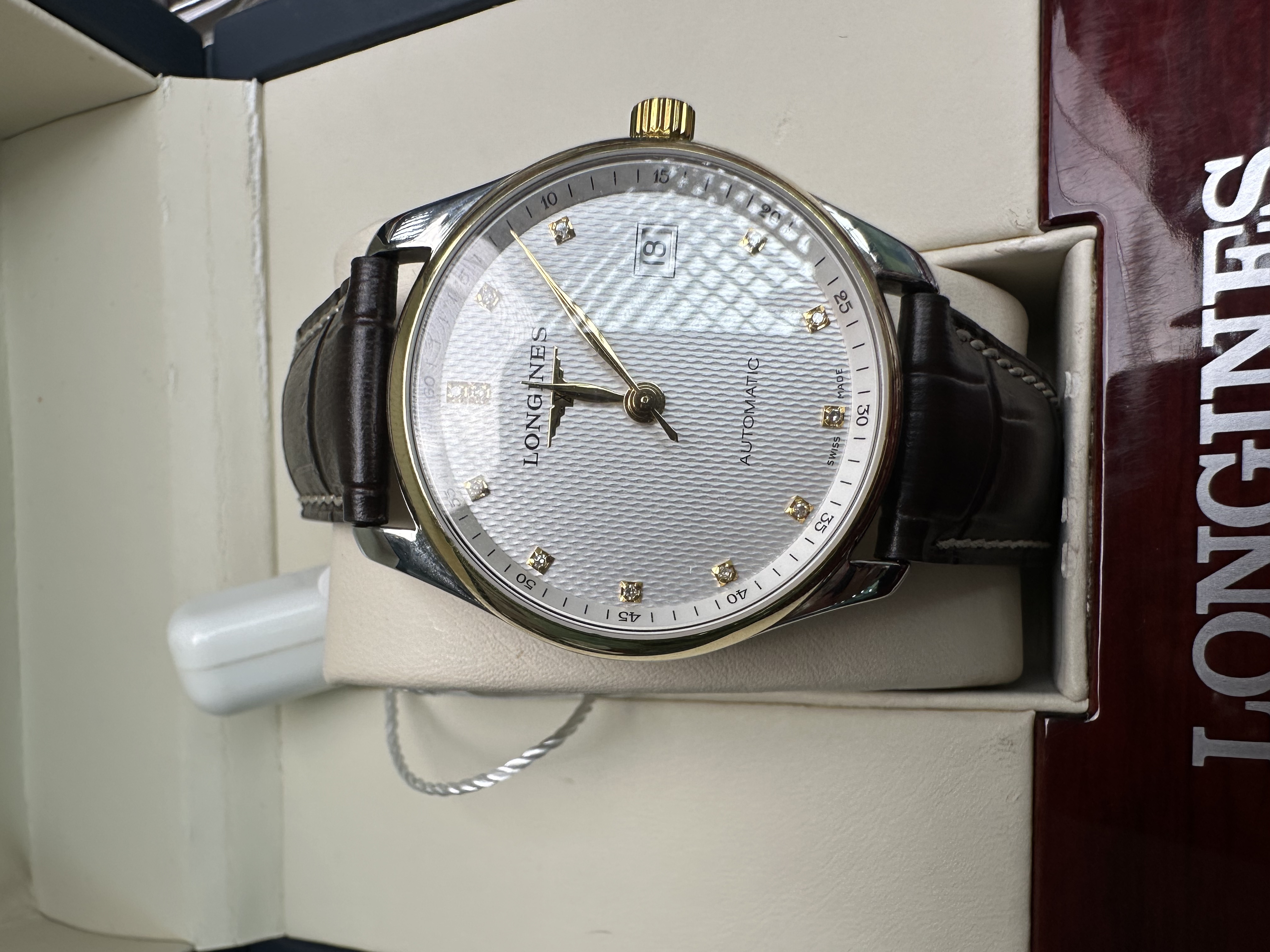 99新 Longines/浪琴 L2.518.5.77.7/518间金白盘原镶钻/后配扣