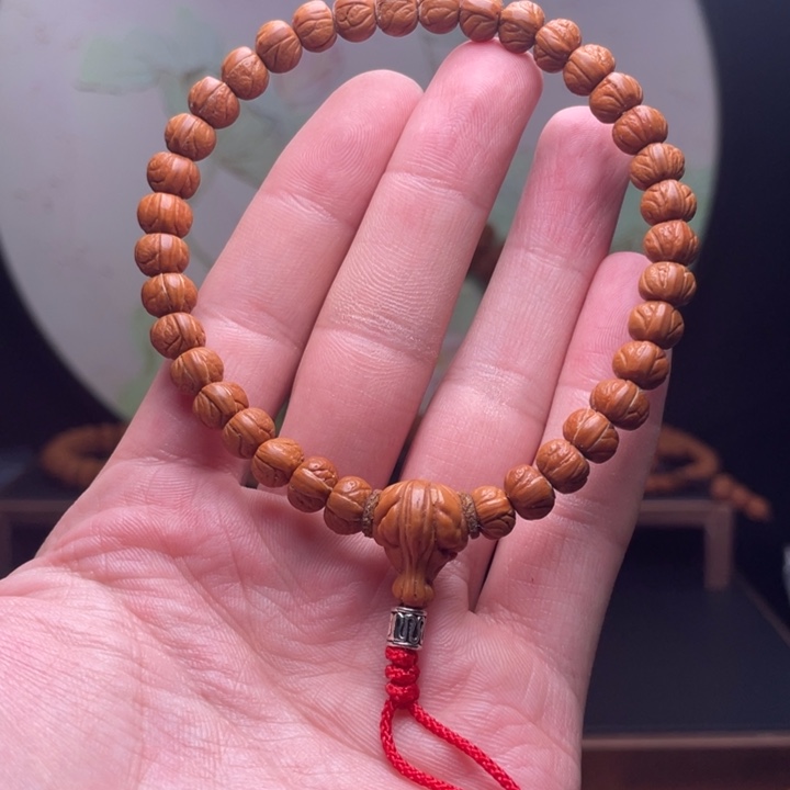 洋***总桃核手串0.8玉龙脊手串