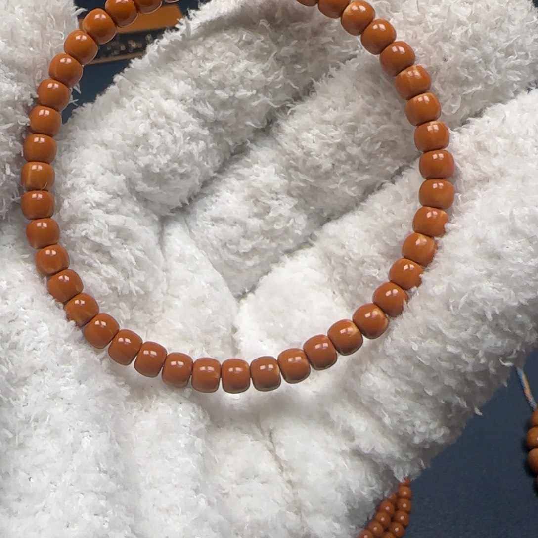 橄榄核手串老挝单圈极限弧三花5.4mm