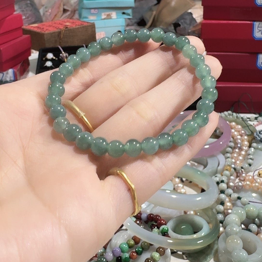 乌***.翡翠未镶嵌颈饰5637