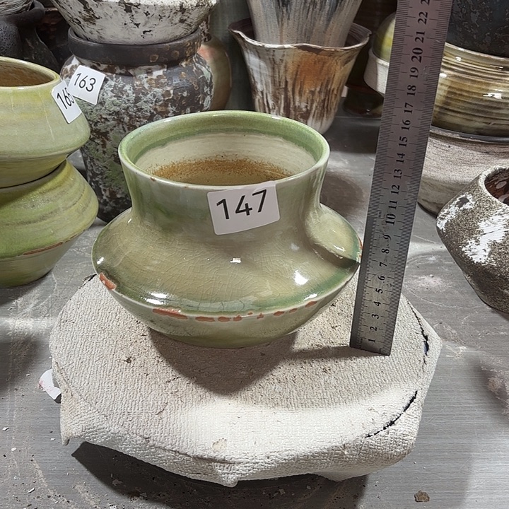 摆件陶高14，内口11，有孔，瑕疵处理有孔147