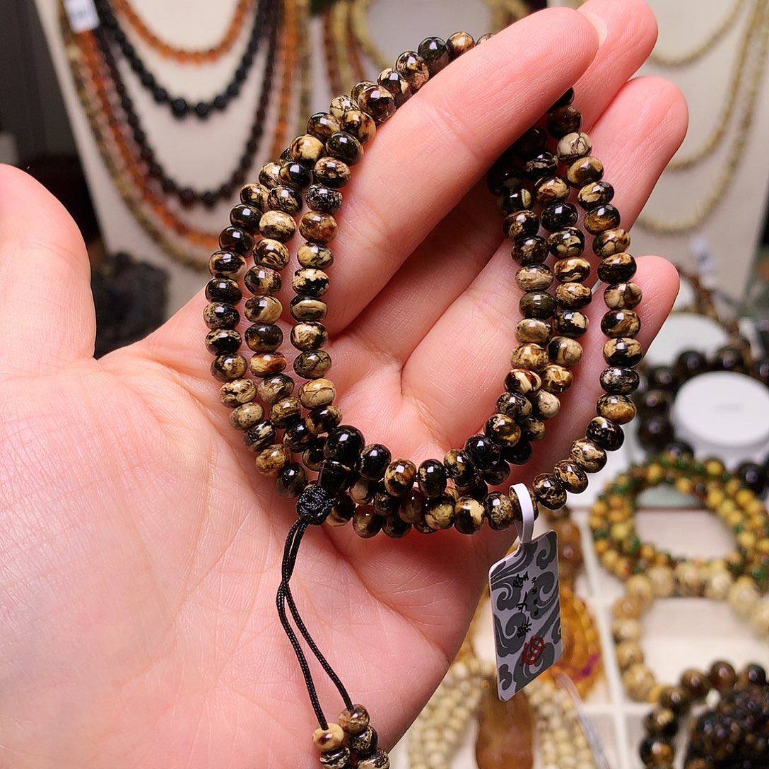 琥珀未镶嵌裸石5/黑白妖花118-58