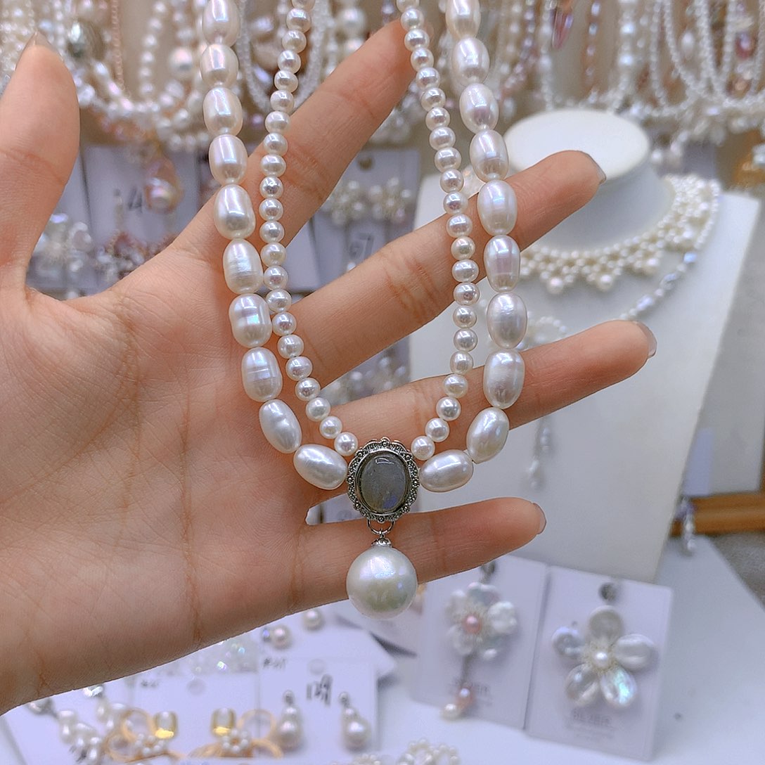 银S925镶嵌淡水珍珠耳饰X****R