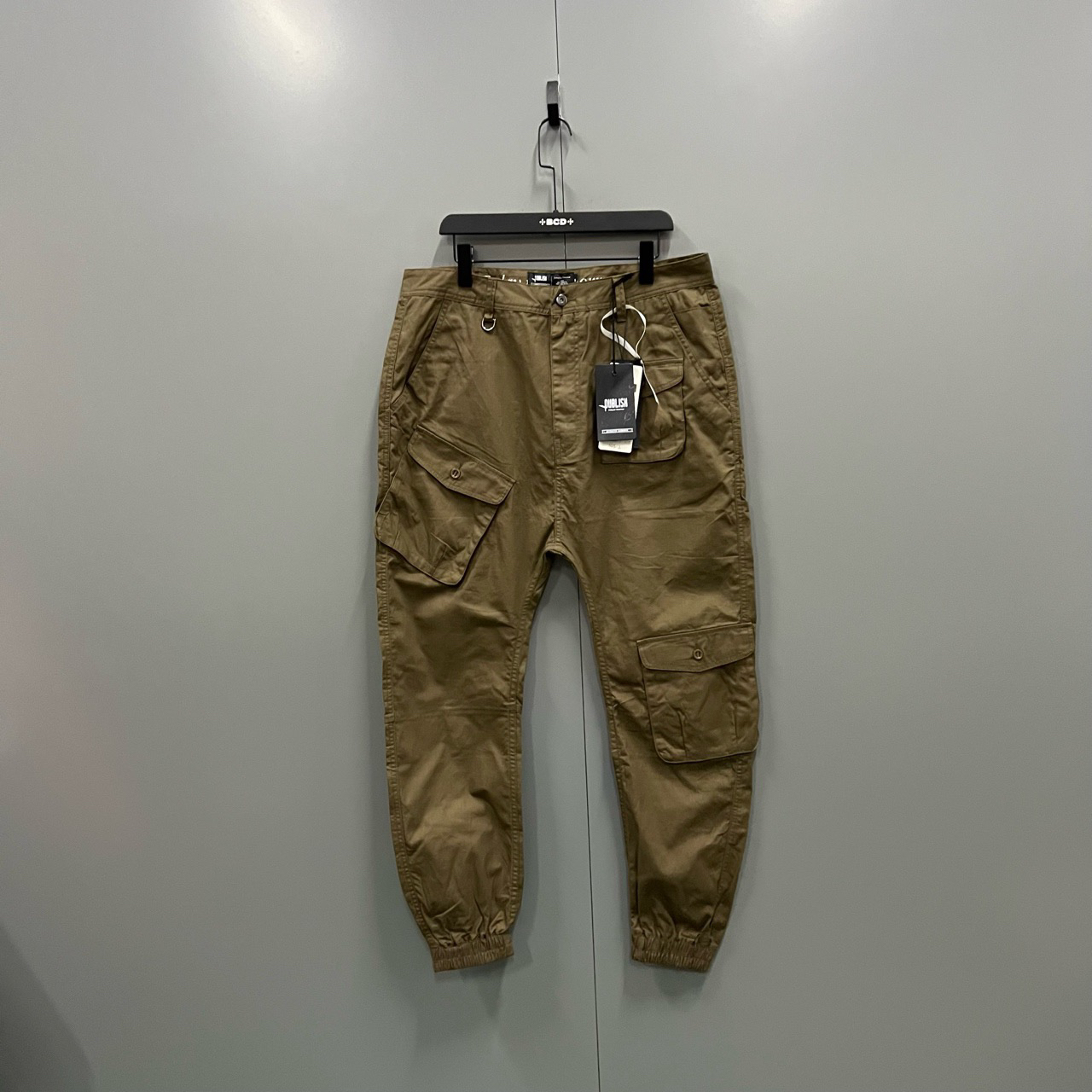 99新  （bb）201 Publish 军绿色束脚裤 36码/吊牌