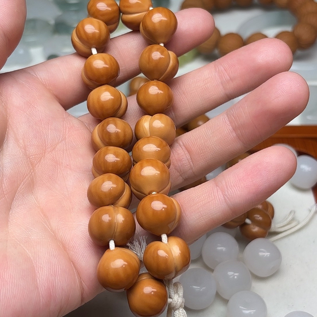 Z***饼吊坠猴头核桃猴头屁桃手串全品