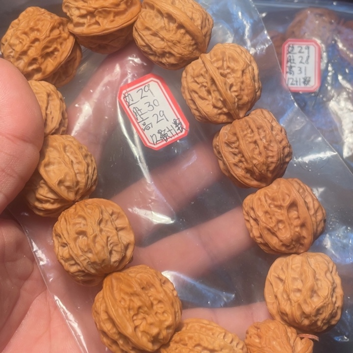 晴****把件桃核野生方块