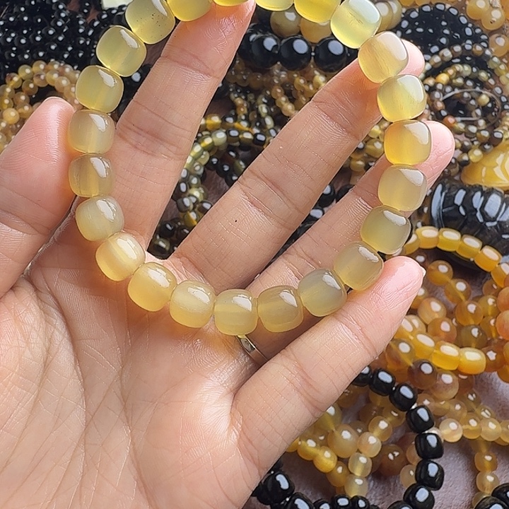 秋***星木质类羊角手串10