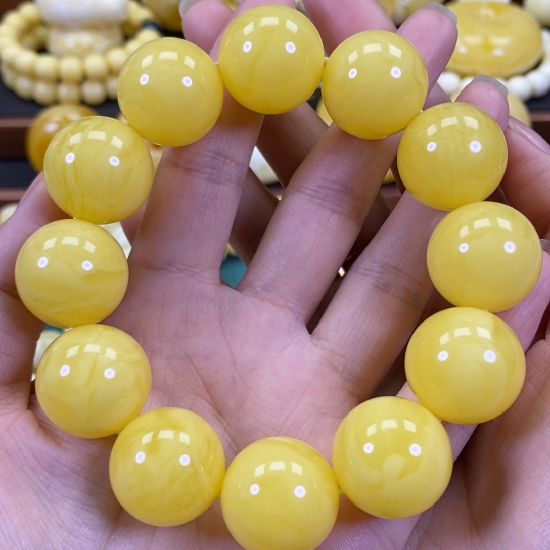 琥珀裸石未镶嵌同料圆珠手串