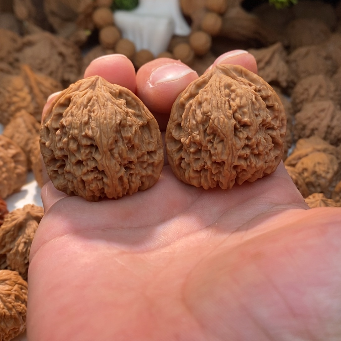 文玩核桃把件逐鹿山一代拉丝南将石40+