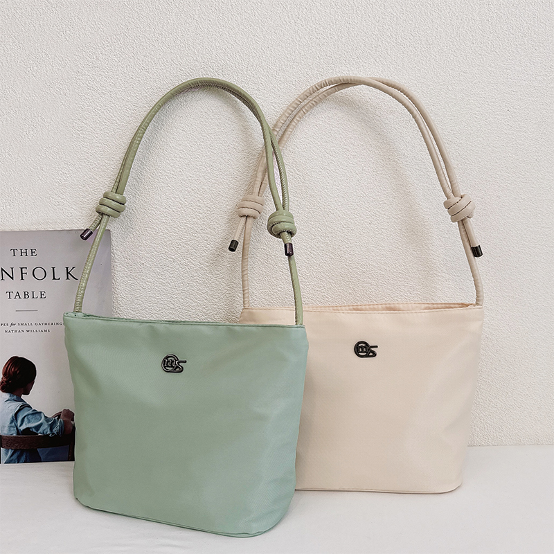 通勤包上班族杂物小拎包手提袋上班专用百搭一年四季通用包包女包