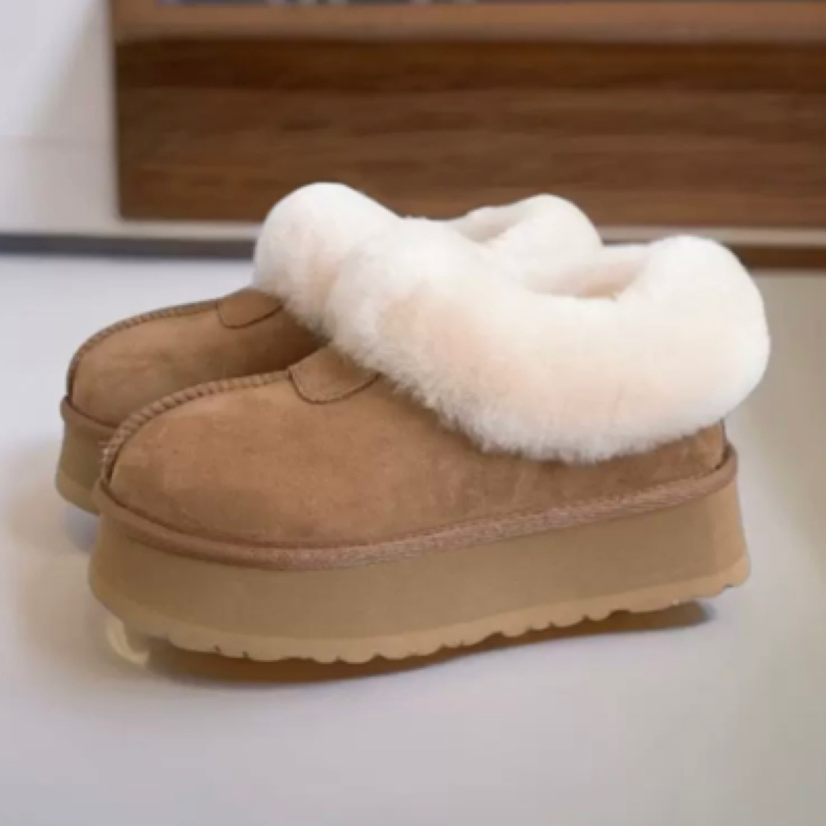 雪地靴厚底女塔次特真皮一脚蹬防滑增高棉靴