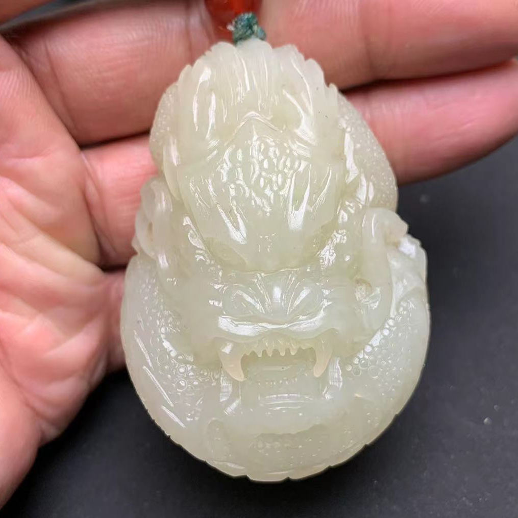 和田玉黄口料龙手把件大龙吊坠