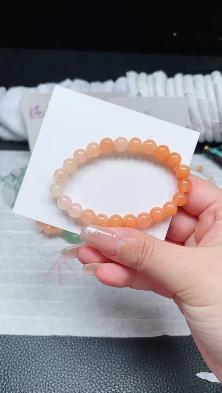 【闪购商品】石英质玉手链未镶嵌柿子红卡8