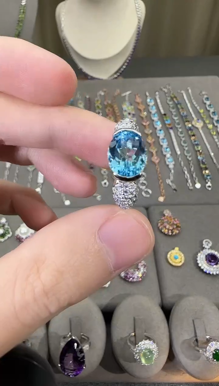 银S925镶嵌戒指托帕石10*8mm戒指妖姬蓝