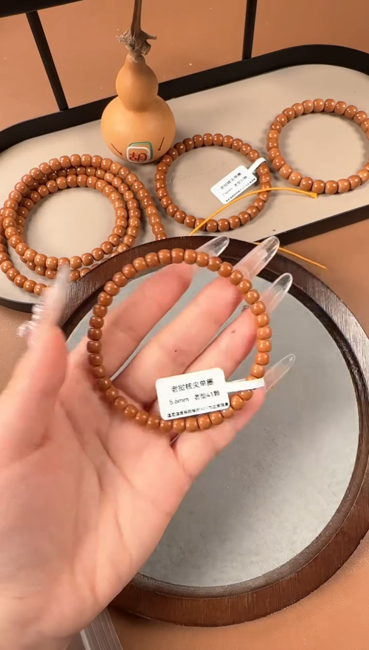 手串橄榄核5.6mm  老挝核尖 老型珠单圈