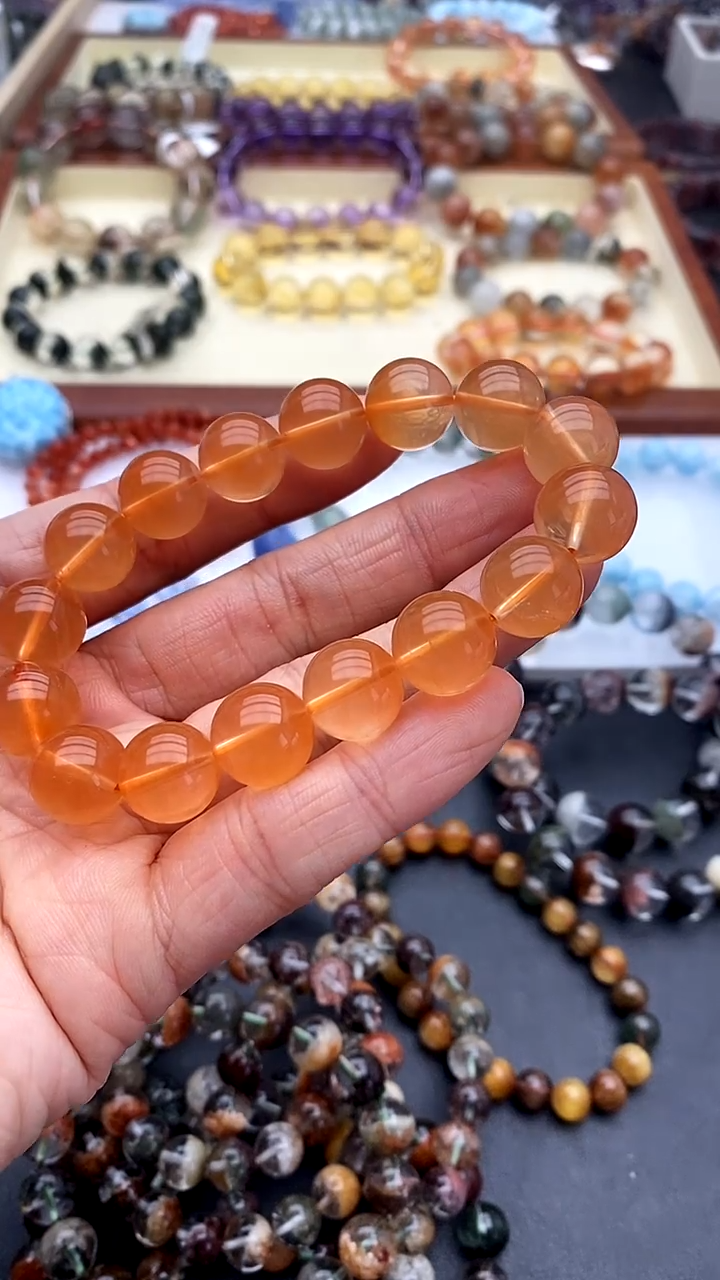 【闪购商品】水晶手链未镶嵌橘红兔毛