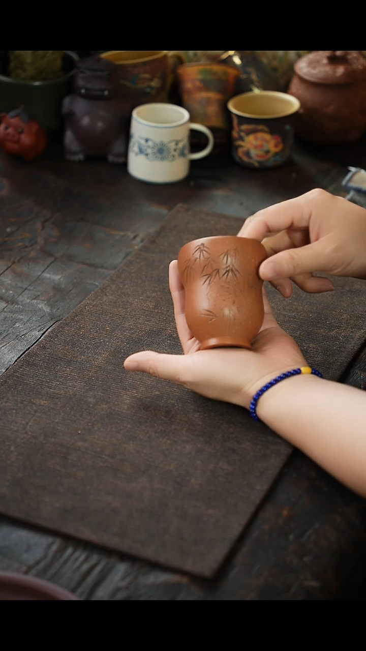 仇峰老段泥刻绘竹子紫砂杯32324