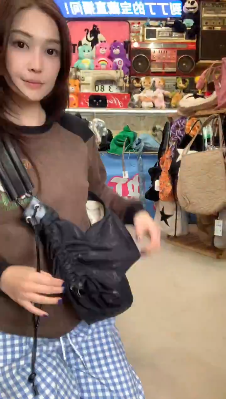 日单卡西尼斜挎侧背抽绳包