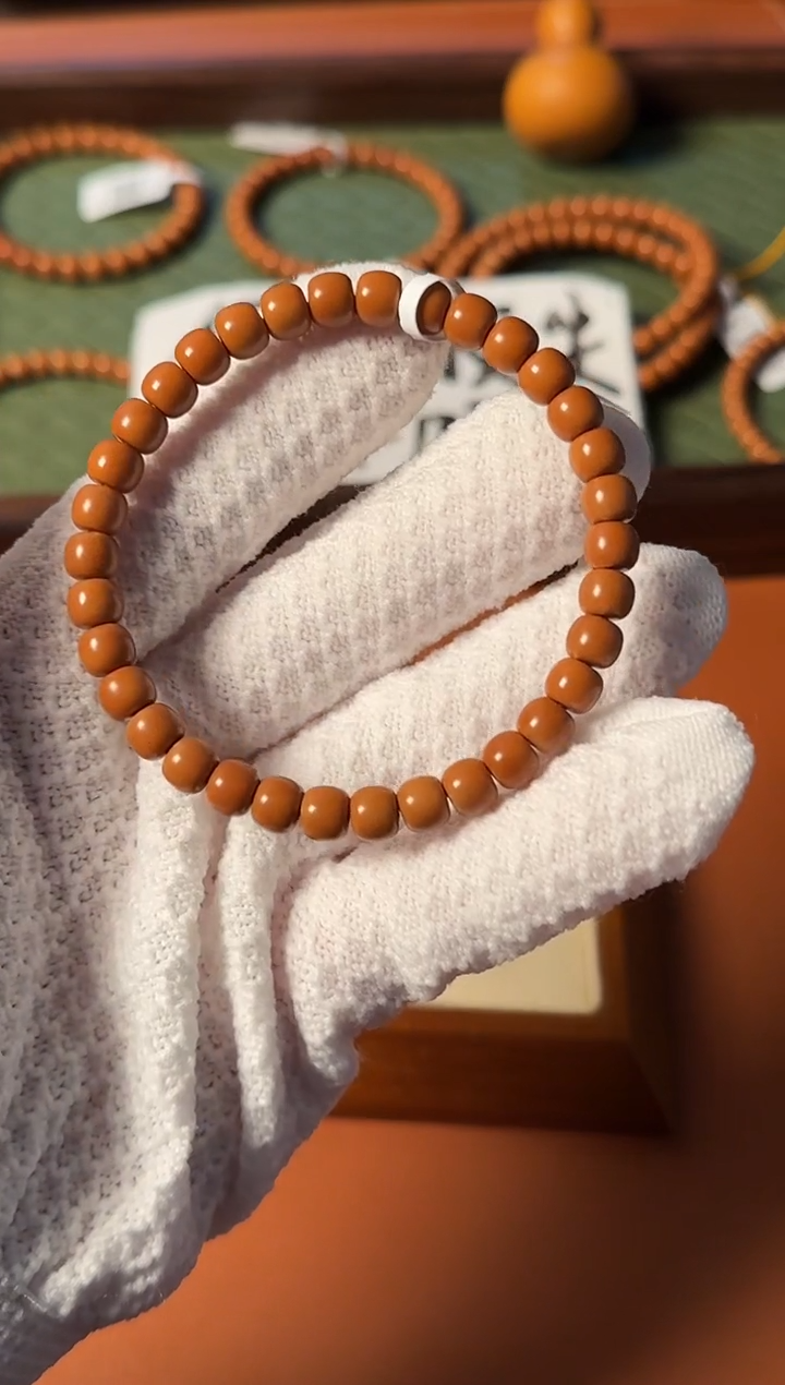 手串橄榄核【168】6.7mm老挝核尖老型单圈