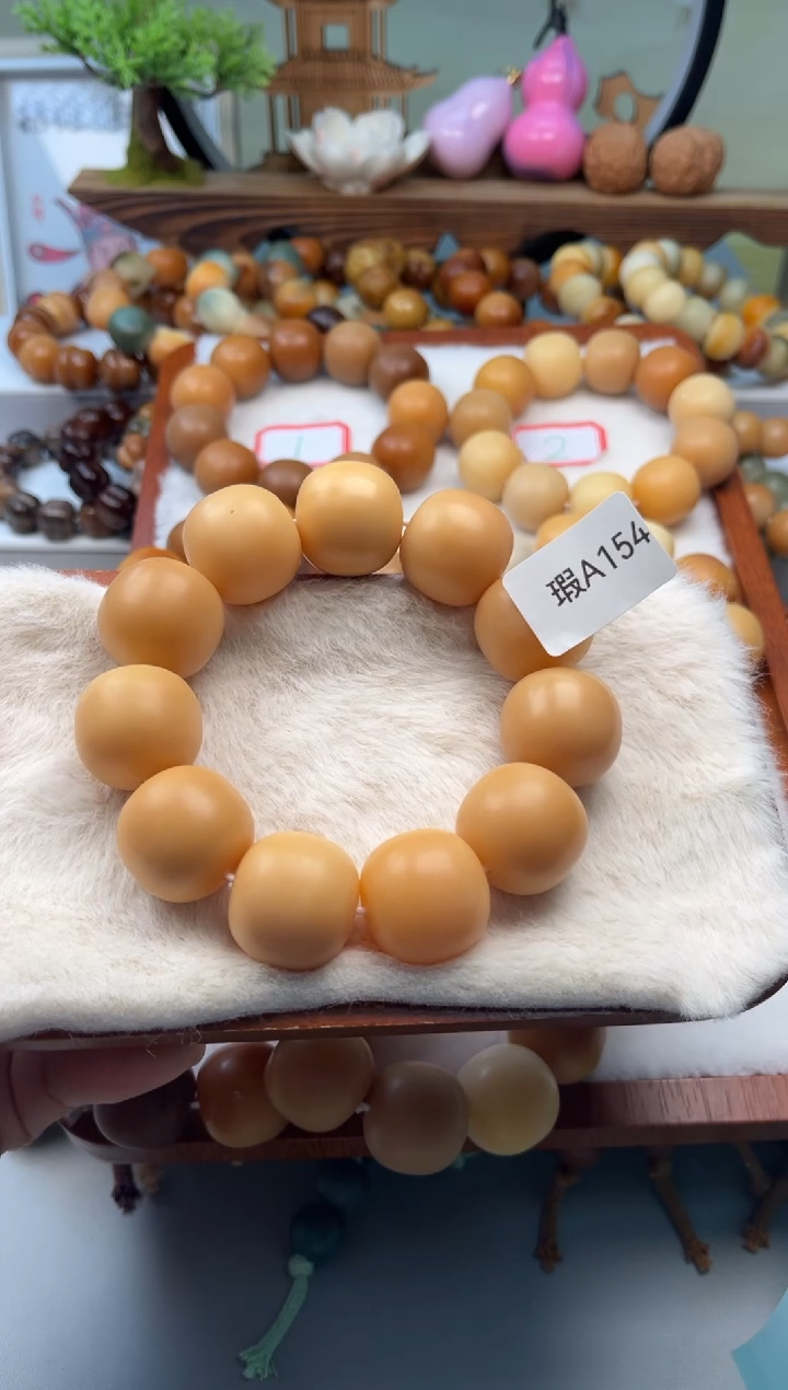 【闪购商品】菩提根/象牙果吊坠瑕A154桶珠24mm一串