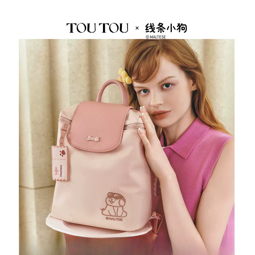 TOUTOU线条小狗联名新款双肩包女旅游轻便背包时尚通勤大容量书包