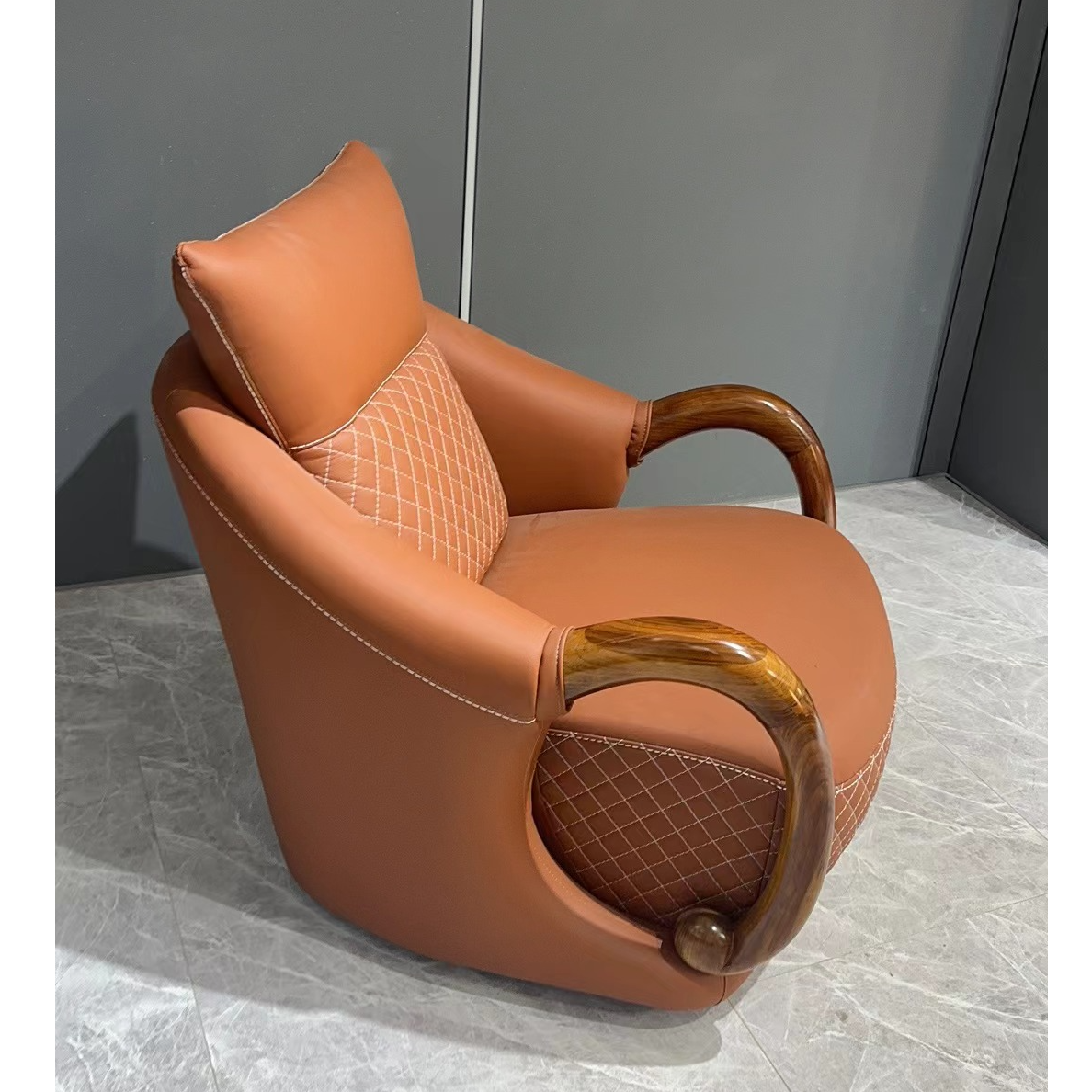 乌金木真皮休闲单椅可旋转