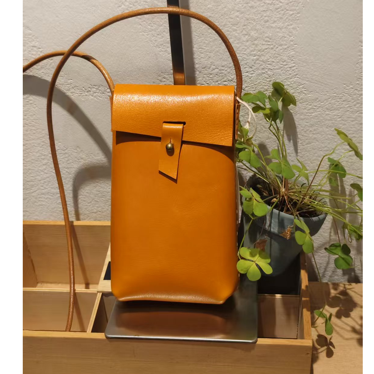 九革头层牛皮手机包