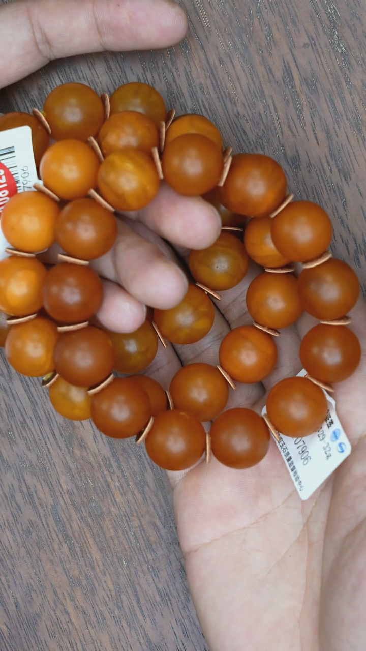 【闪购商品】琥珀裸石未镶嵌老蜡微瑕橘皮手串多样性发其一
