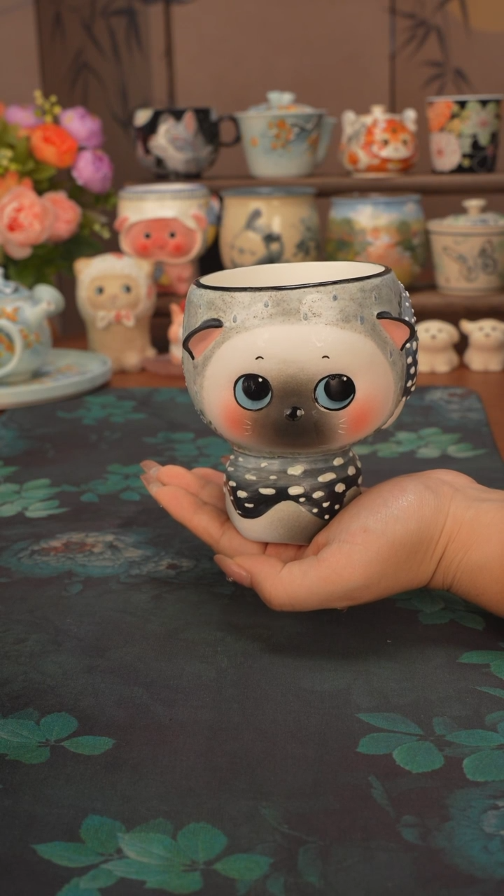 菜老头  暹罗猫手握杯