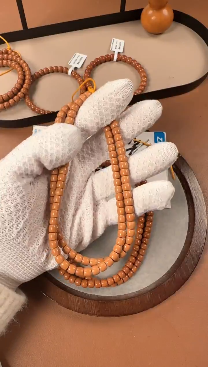 手串橄榄核6.1mm核尖老挝料108，直切珠