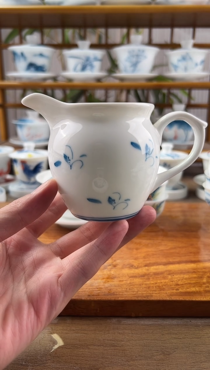 微瑕玉兰带把公道杯