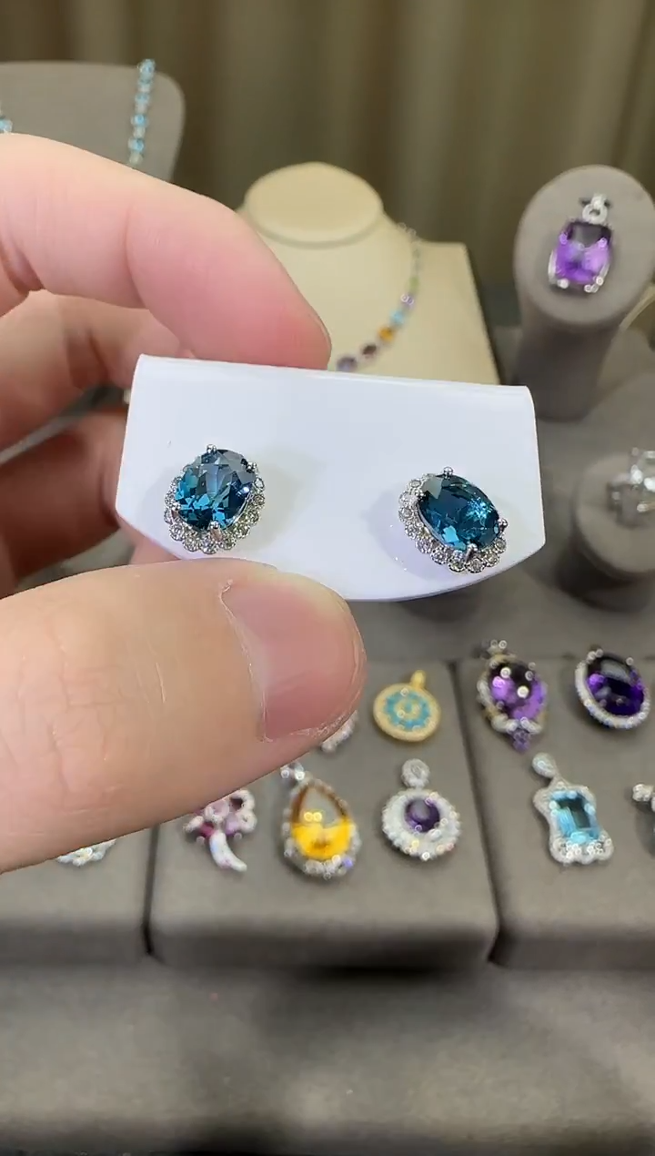 银S925镶嵌托帕石耳饰9*7mm伦敦蓝耳钉