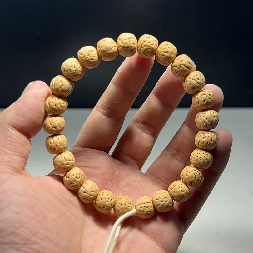 1.1（盘锦911）桃核手串9