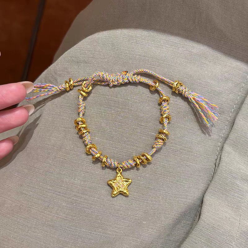 瑞诺黄金星星盘缠编织手链女新款足金999手工手绳生日礼物送女友