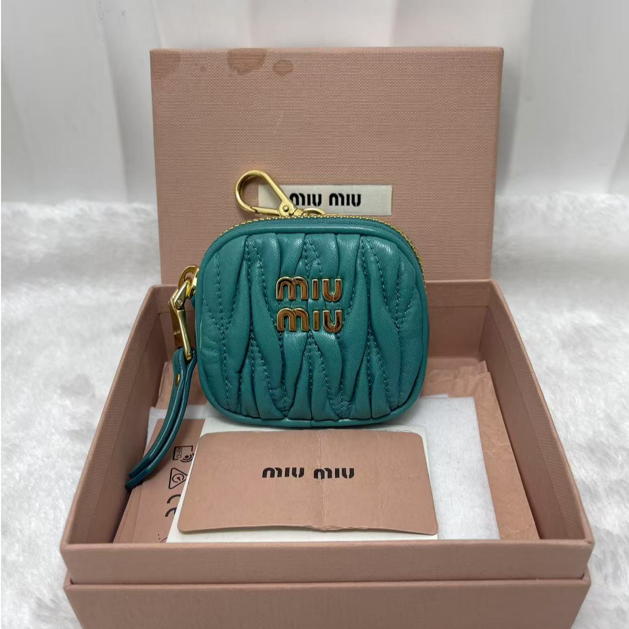 95新 MIU MIU/缪缪 湖蓝色褶皱耳机包/零钱包