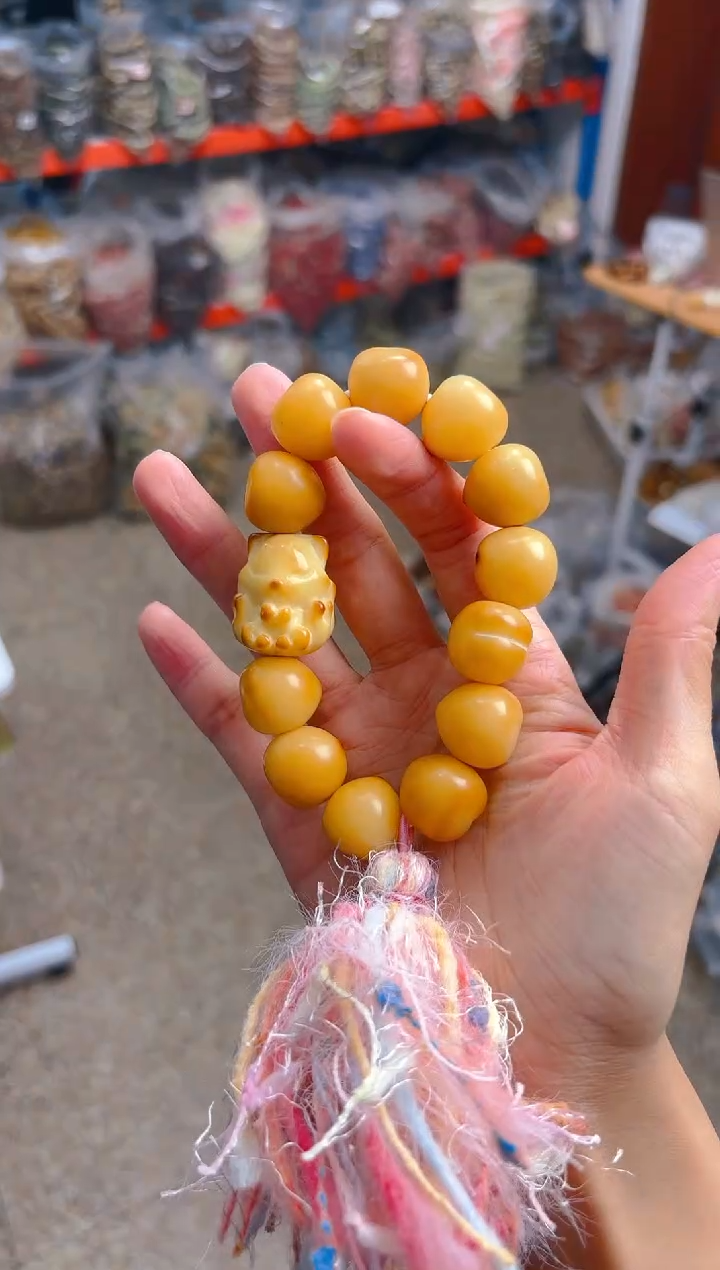 吊坠菩提根/象牙果小卡黄色屁桃手持  凤九