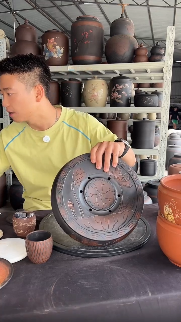 罐线雕荷花大茶海