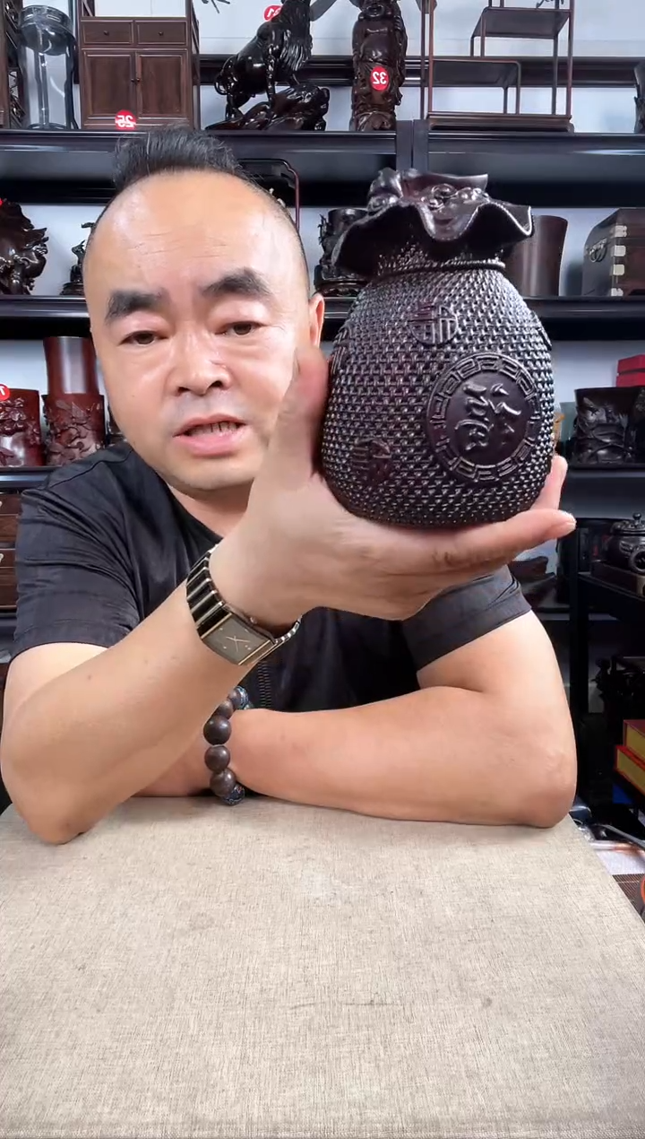 木钱袋子老李红木工艺品