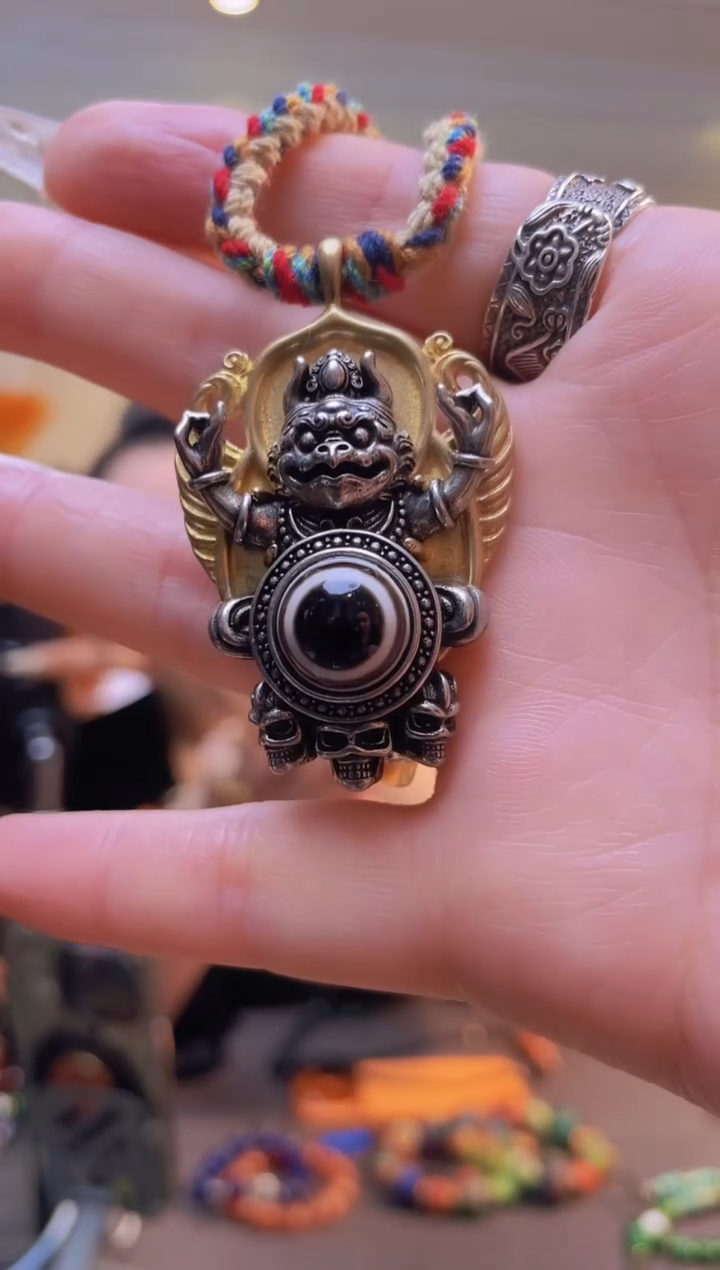 铜铁合金类大鹏板眼吊坠