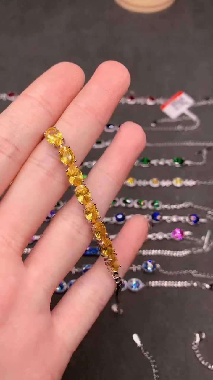 【闪购商品】彩色蓝宝石手链银S925镶嵌........