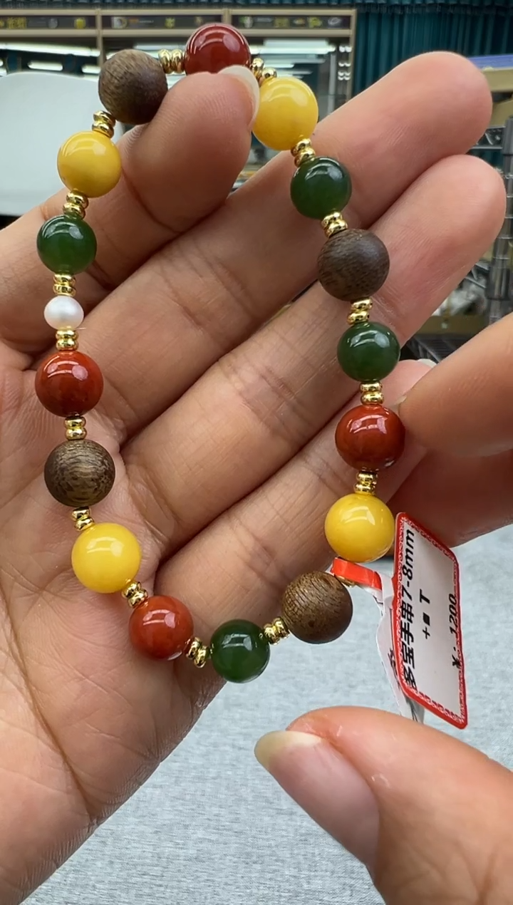 未镶嵌琥珀手链137秒拍号假一罚十