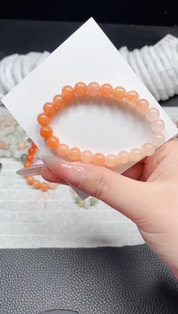 【闪购商品】石英质玉手镯未镶嵌柿子红卡8
