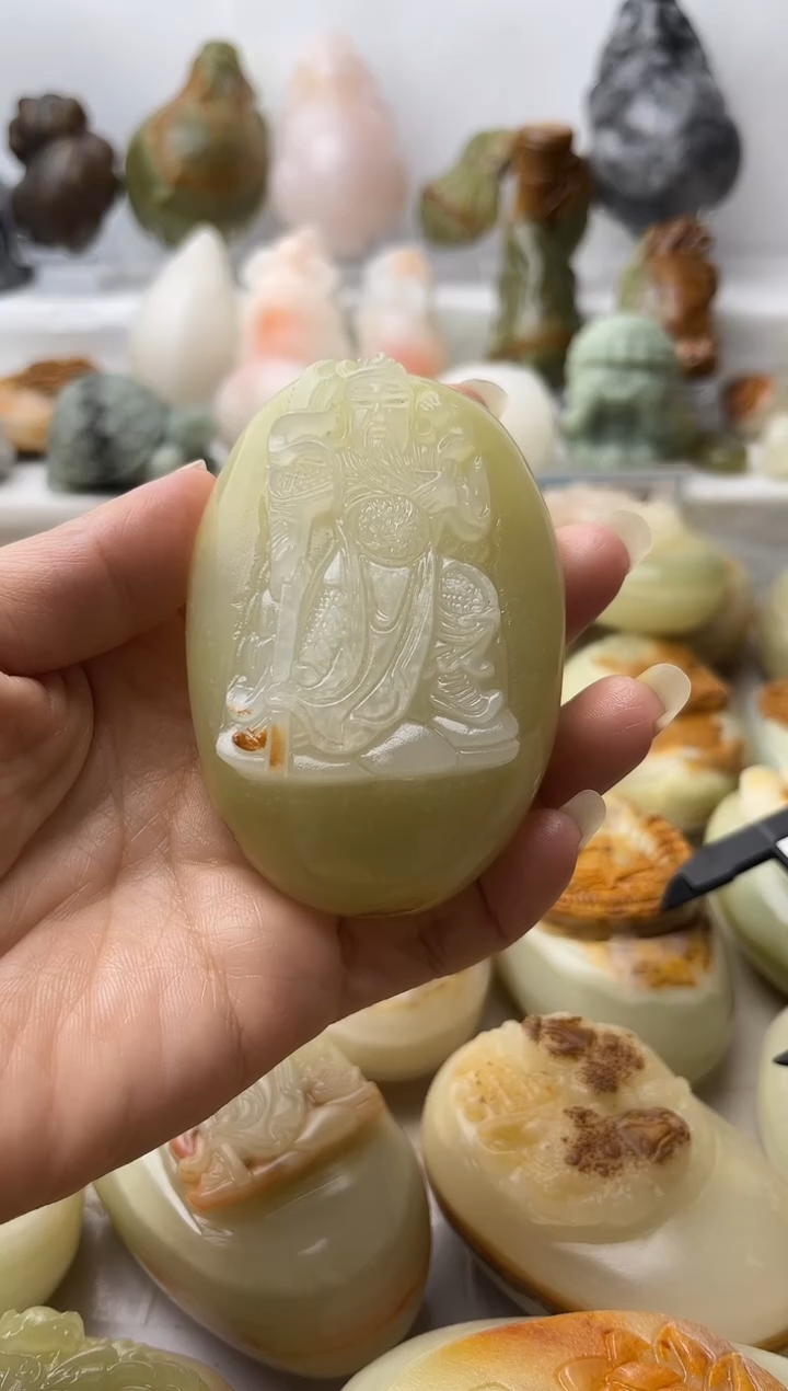 石材方解石手把件不退换关公