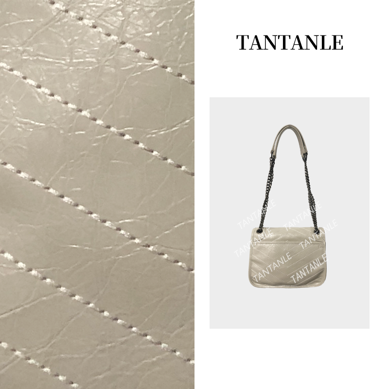 高定气质简约单肩腋下斜挎流浪包带字女包