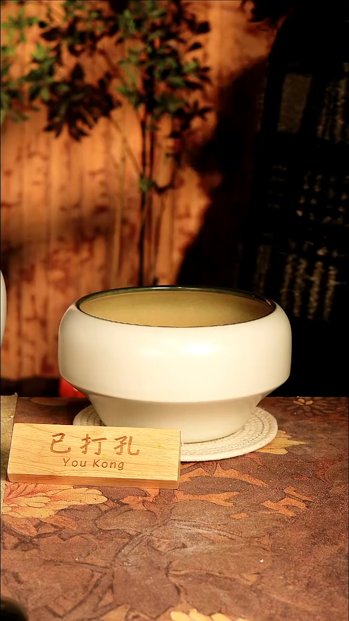 陶瓷4-157高15口22误差2已打孔