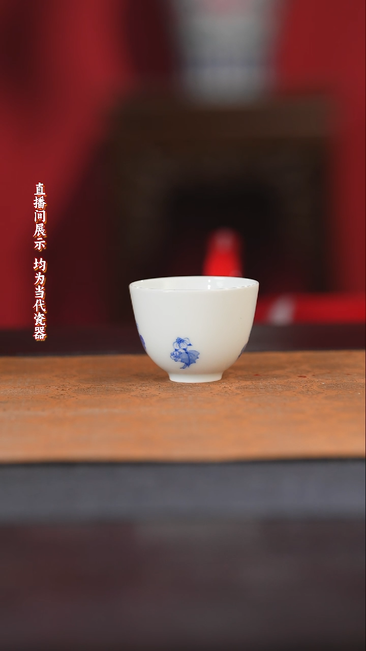 开***奶御窑元华堂青花敦煌折枝花卉杯
