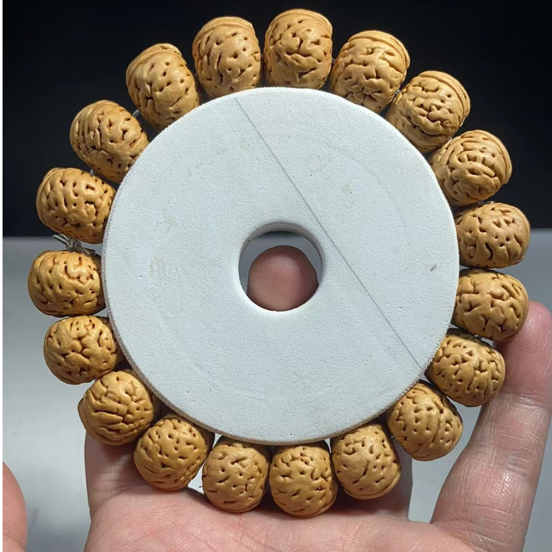 1.7（树王纽扣）桃核手串