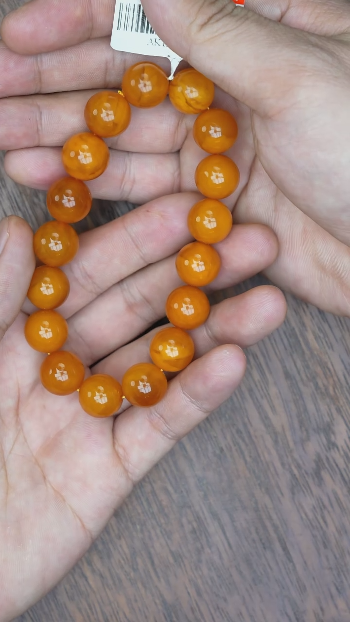 【闪购商品】琥珀裸石未镶嵌老蜡圆珠手串