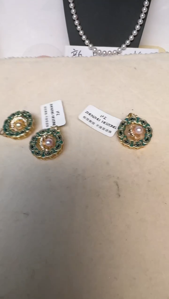 颈饰银S925镶嵌海水珍珠发其一